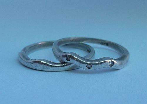 A SUPERB 2 PIECE STERLING SILVER DESIGNER STACKING RING SET WITH THREE REAL DIAMONDS ....WOW !!!