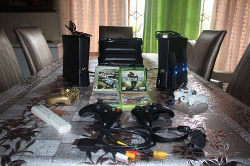 2 XBOX 360 Consoles 250 GB SLIM CONSOLES WITH 10+ GAMES, 5 CONTROLLERS AND OTHER ACCESSORIES