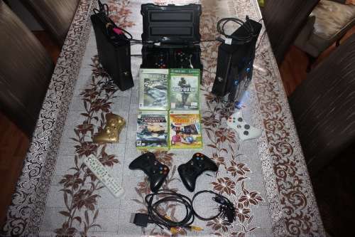 2 XBOX 360 Consoles 250 GB SLIM CONSOLES WITH 10+ GAMES, 5 CONTROLLERS AND OTHER ACCESSORIES