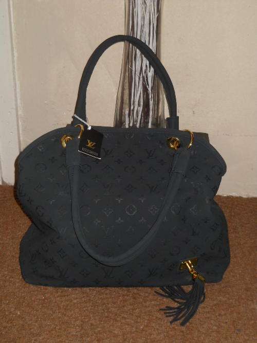 Brand new authentic Suede Louis Vuitton Bag!!!! please serious bidders only