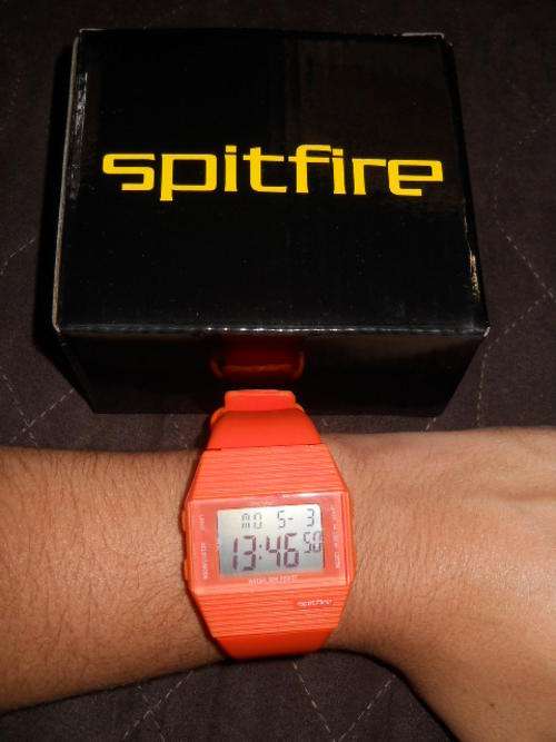 Brand new ladies funky orange spitfire watch.