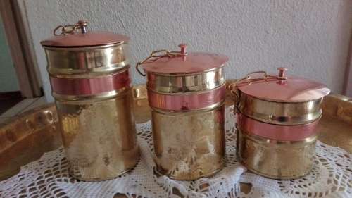 Set of 3 yellow and red copper cannisters