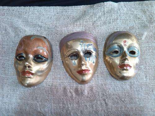Brass mask wall hangings