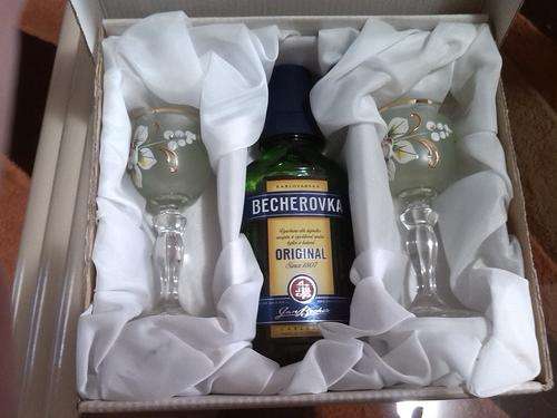 Sealed original Becherovka with two beautiful painted glasses