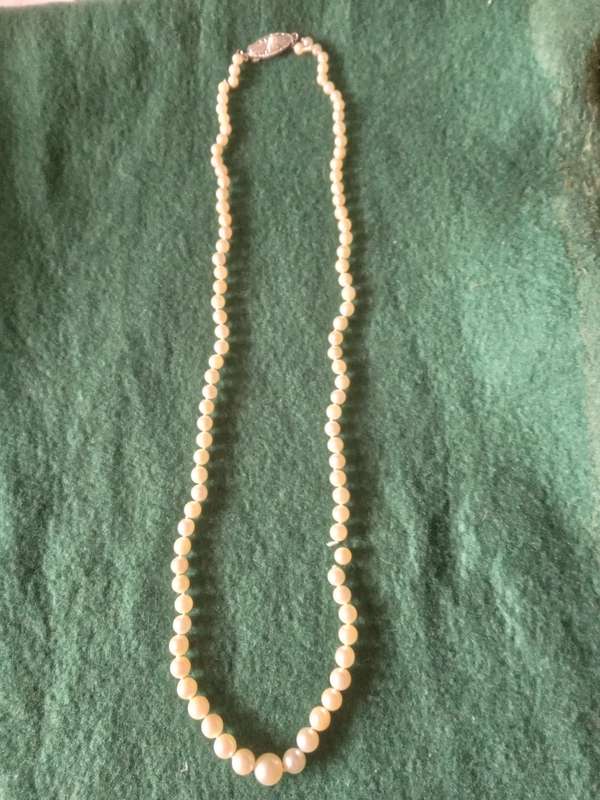 String Of Graduating Cultured Sea Pearl Necklace - (99 Beads - 7mm-2.5mm) - Needs to be restrung