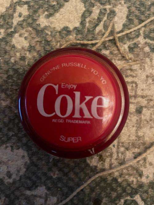 Vintage Coca-Cola Yo-Yo with red rim