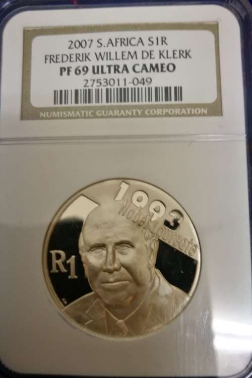 Mandela and De Klerk. Collection of coins, ballot paper, first day covers etc.