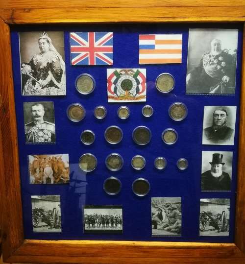Framed set of ZAR and British coins used during the 2nd Boer war.1899 to 1902.
