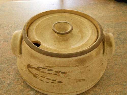 Very heavy large pottery bowl with lid