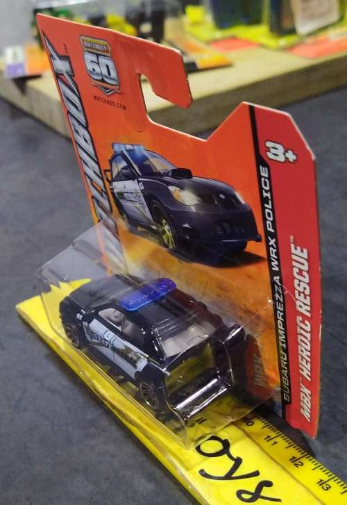 2012 Matchbox ~ BBK39-0818 Subaru Imprezza WRX Police ~ Mint on Short card