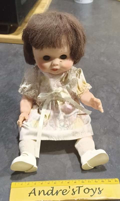Brown hair little girl -  doll ` eyes move