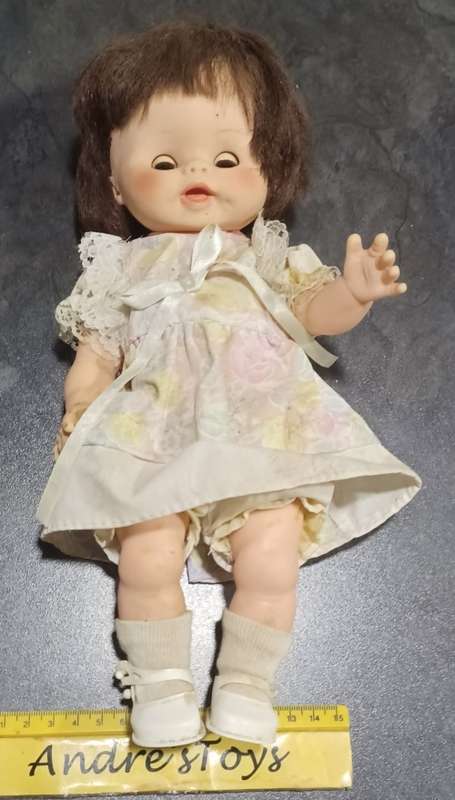 Brown hair little girl -  doll ` eyes move