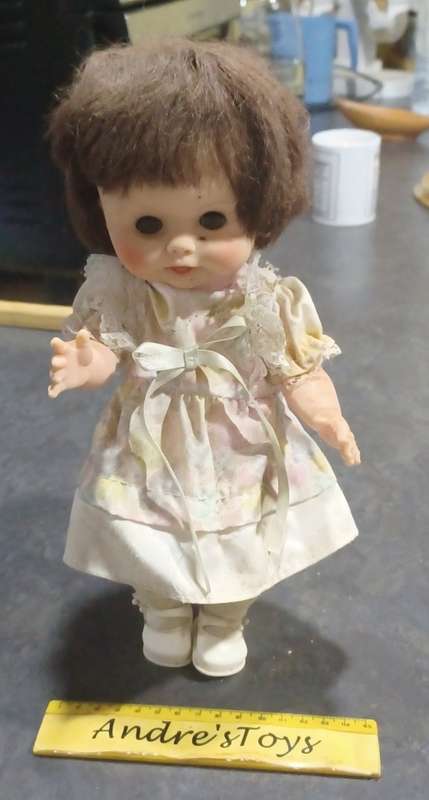 Brown hair little girl -  doll ` eyes move