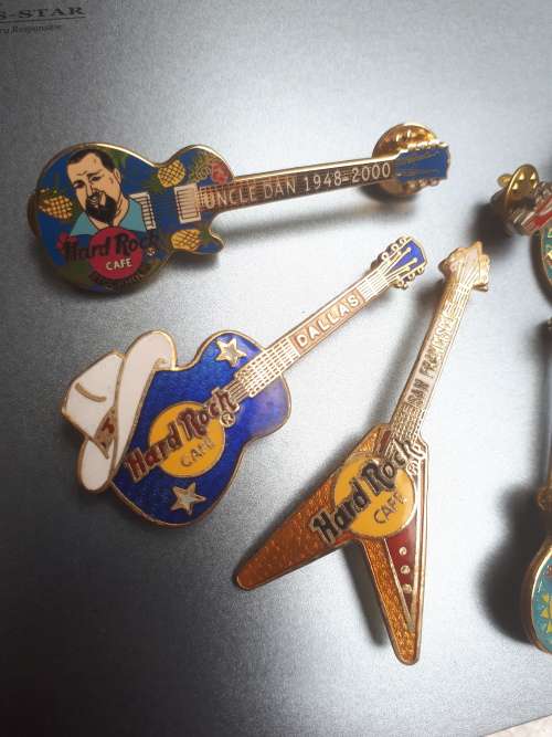 Hard Rock Cafe Guitar pins x 6 plus one other rock guitar