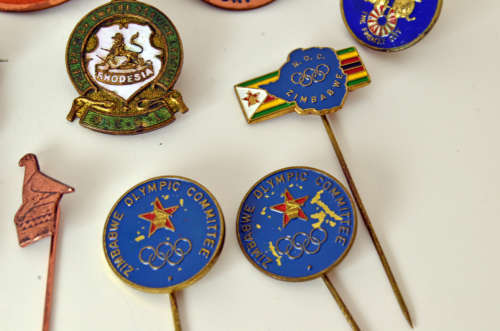Rare Northern Rhodesia Olympic and Empire Games NOC badge plus selection of Rhodesian pin badges