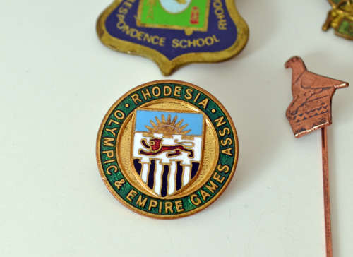 Rare Northern Rhodesia Olympic and Empire Games NOC badge plus selection of Rhodesian pin badges