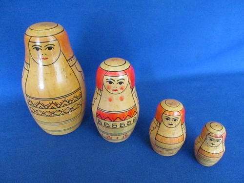 Set Of Four Wooden Babushka/Matrioshka Dolls