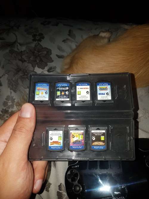 Basically new Ps Vita with 8 games and 4gb memory card.