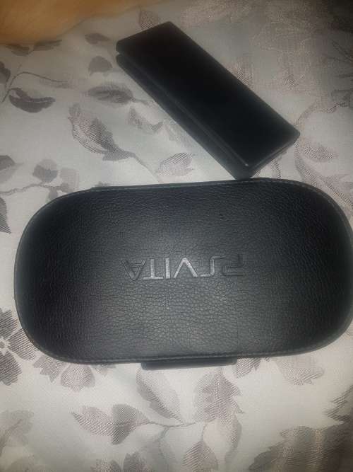 Basically new Ps Vita with 8 games and 4gb memory card.
