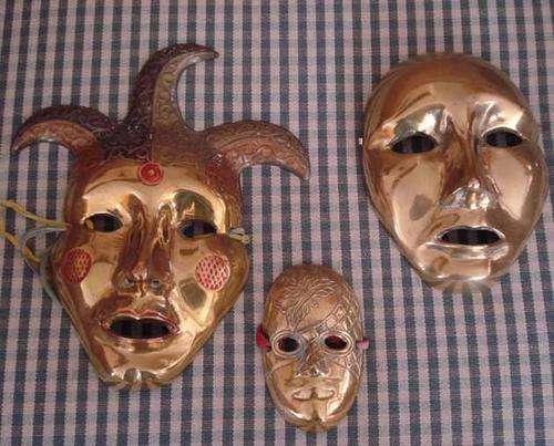 *** THREE BRASS MASKS ***