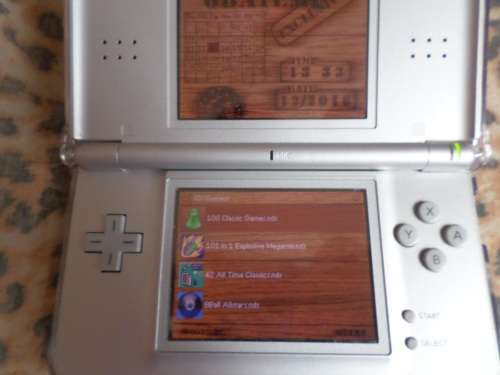 Nintendo DS Lite Silver *BOXED* With DS cover and with R4i + 7 Boxed games
