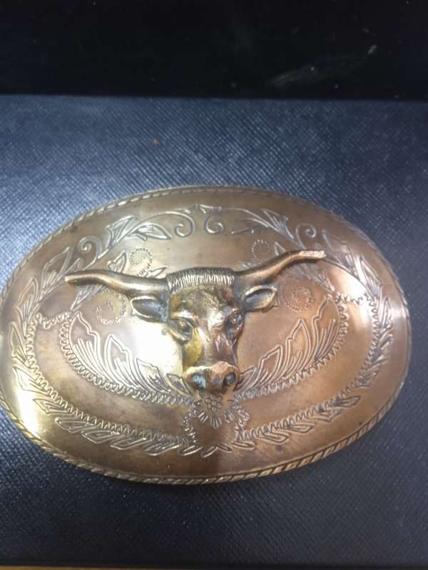 Stunning brass belt buckle Bull motive with ornate pattern