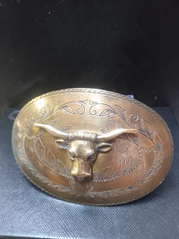 Stunning brass belt buckle Bull motive with ornate pattern