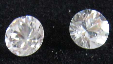 FINE NATURAL WHITE ZIRCON .60ct  4mm