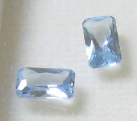 Set of 2 Emerald cut Sky Blue Topaz .60ct 5x3mm