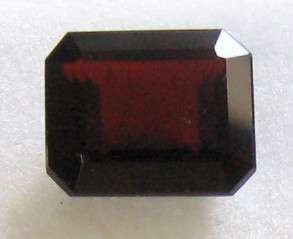 Wonderful  7.20ct Emerald cut Win Red Garnet 12x10mm