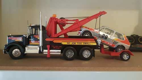Tow Truck with twin booms & VW Golf on a Trailer