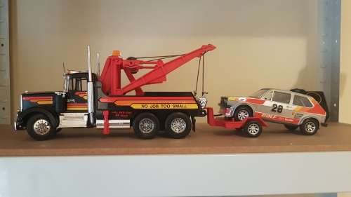 Tow Truck with twin booms & VW Golf on a Trailer