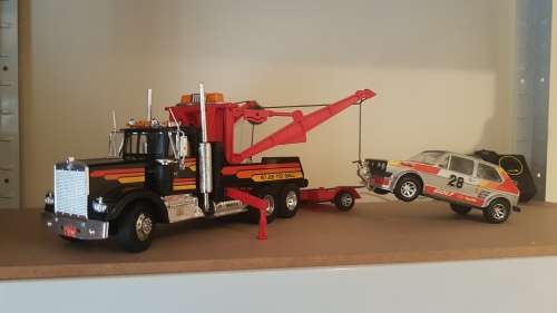 Tow Truck with twin booms & VW Golf on a Trailer