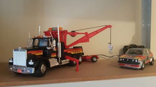 Tow Truck with twin booms & VW Golf on a Trailer