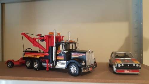 Tow Truck with twin booms & VW Golf on a Trailer