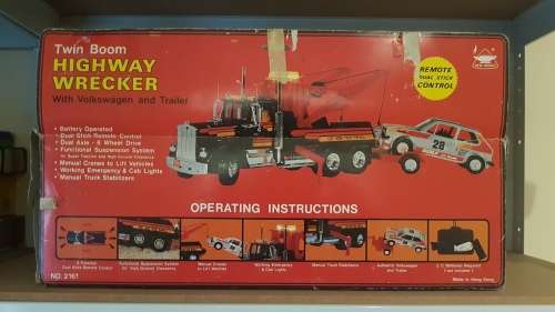 Tow Truck with twin booms & VW Golf on a Trailer