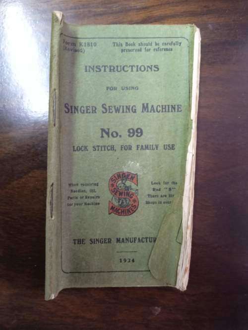 Singer Sowing machine + book + key Immaculate condition
