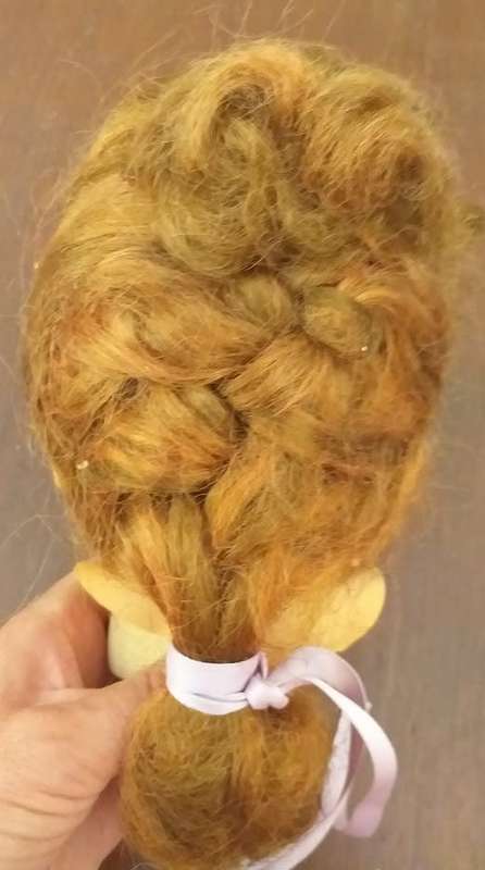 Antique doll head seems complete