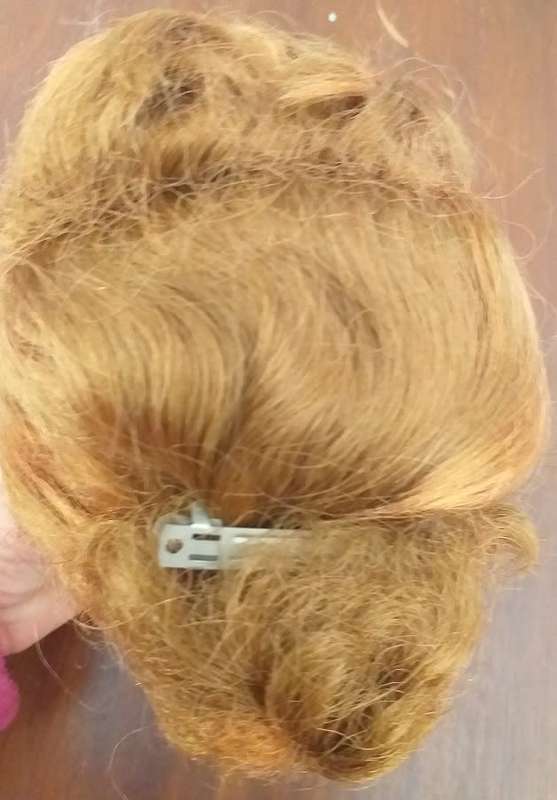 Antique doll head seems complete