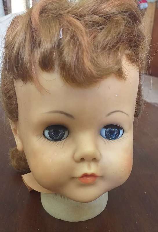 Antique doll head seems complete