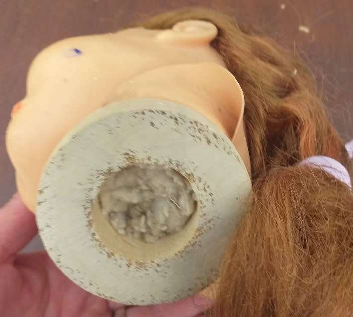 Antique doll head seems complete