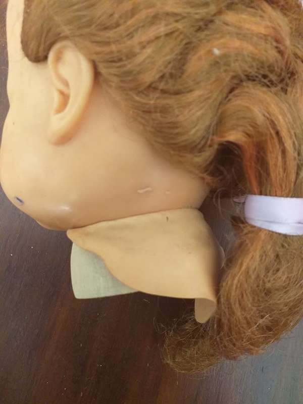 Antique doll head seems complete