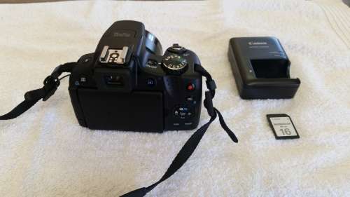Canon PowerShot SX50 HS 50x Optical Zoom Digital Camera - Cannon Charger and 16 GB Memory card