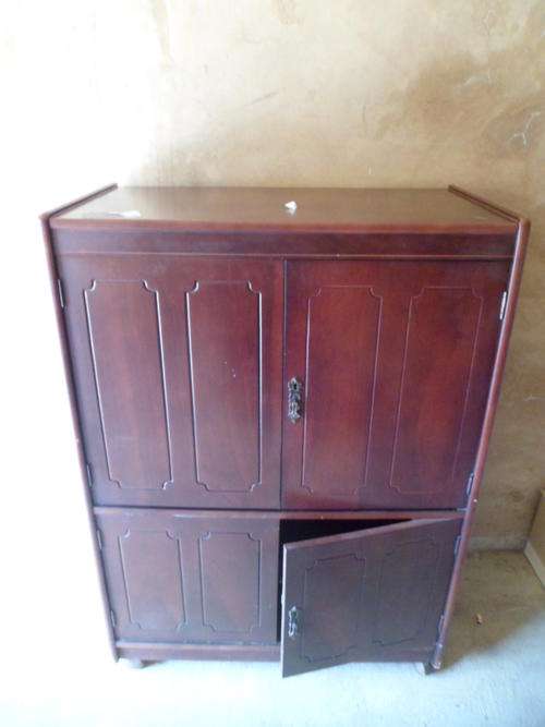 TV CABINET MADE OUT OF DARK WOOD