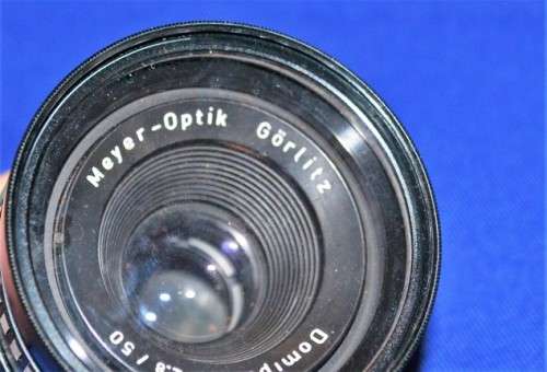 Meyer Optik and Dejur Camera Lenses in Cases