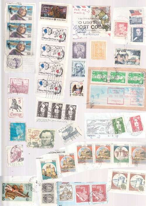 Stamp packet - lot of 100 + stamps see scans