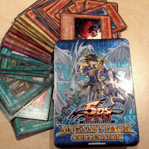 65 Yu-Gi-Oh! TRADING CARDS in 'DUELIST PACK COLLECTION' tin