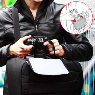 Easily draw your DSLR by swinging the bag from back to front and opening the quick draw flap.