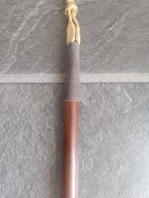 Imbuia wood and genuine leather whip.