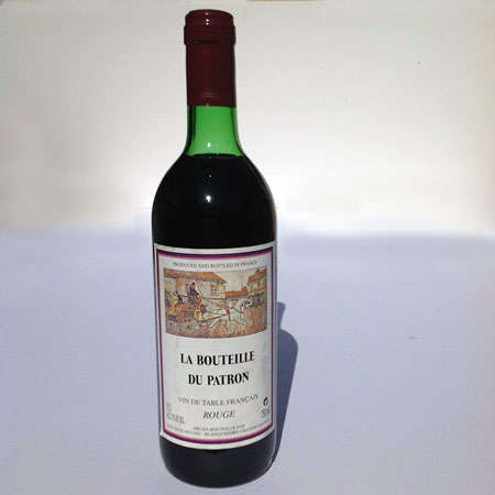 LA BOUTEILLE DU PATRON (FRENCH). 750ml Collectable red wine. No Vintage.